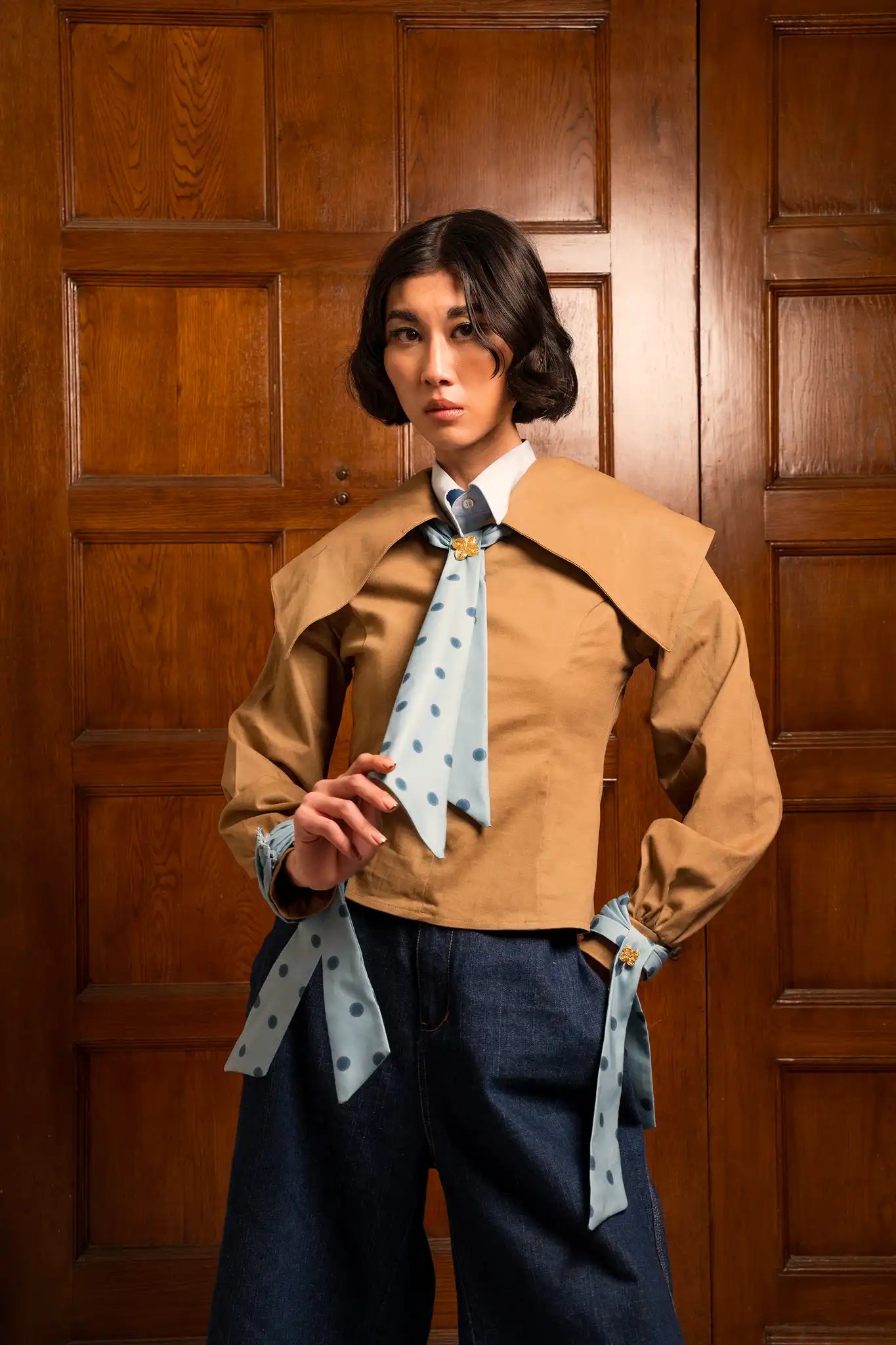 Elegant camel empress top with a refined and confident design