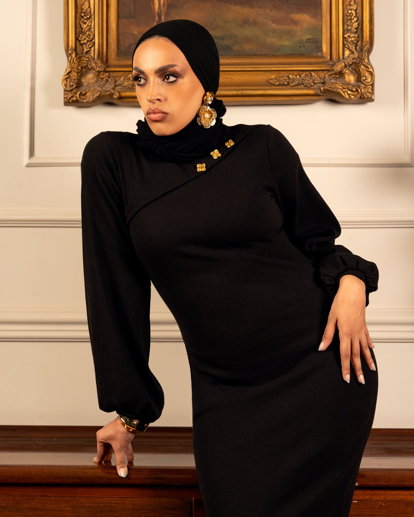 Iconic black dress with a sleek and elegant design, showcasing timeless style and sophisticated look