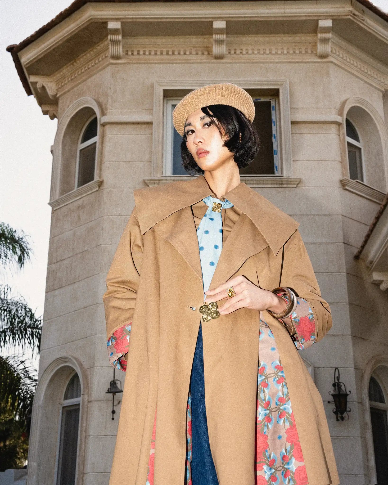 Imperial camel trench coat in a warm camel tone, featuring a timeless elegant design that conveys luxury and confidence