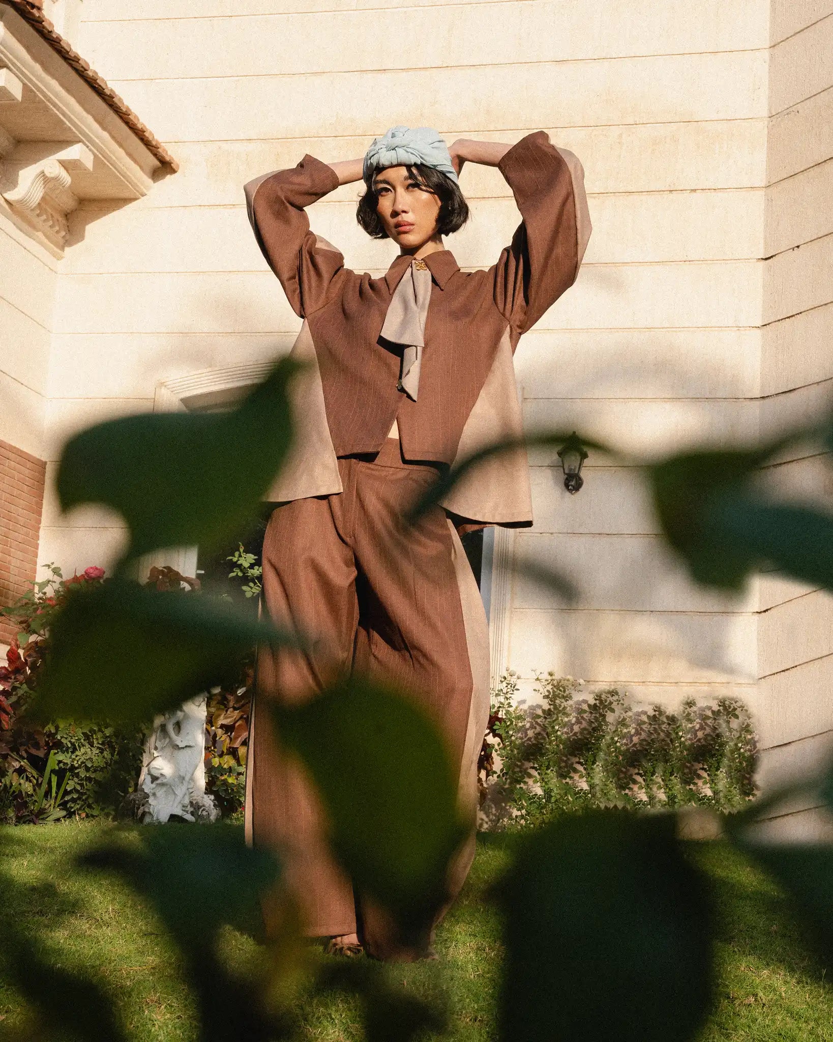 Model wearing the Pavlin Cocoa Grace set with rich cocoa color and a soft graceful silhouette