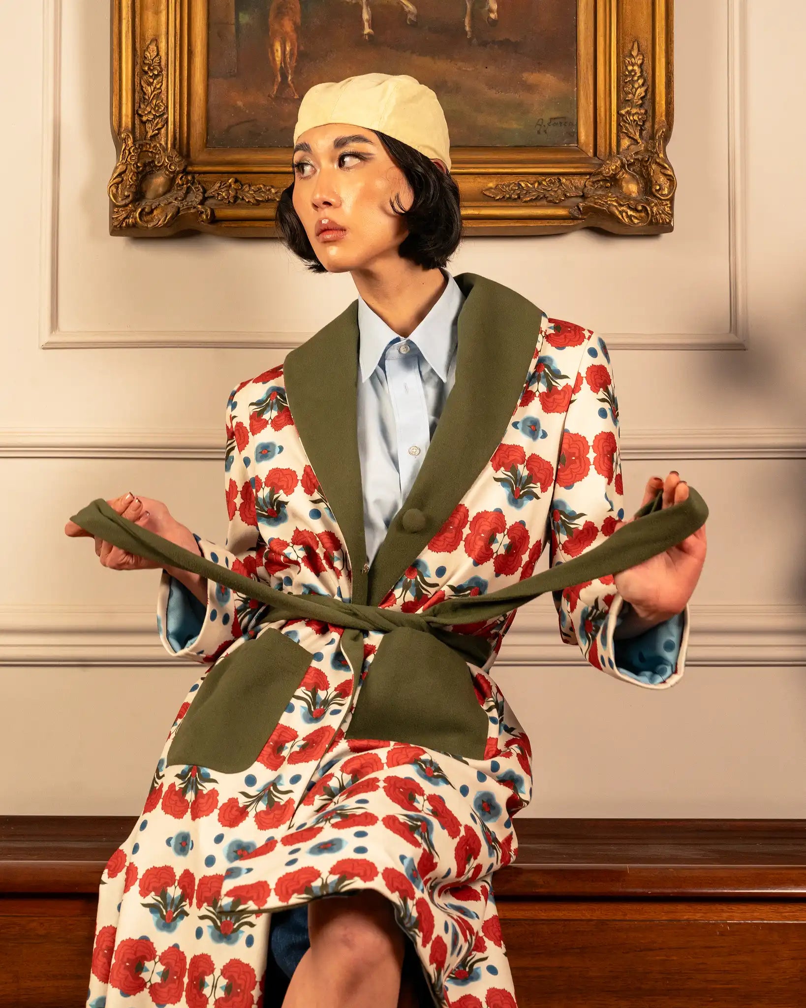 Elegant rosette coat with floral accents and a vintage-style design