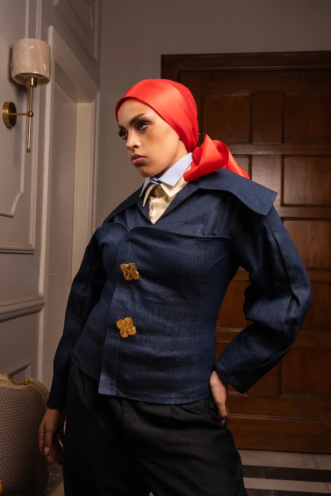 Royal crest top featuring a refined elegant design inspired by timeless heritage, conveying sophistication and confidence